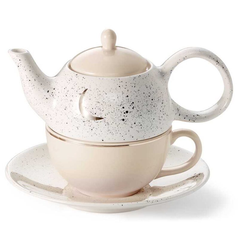 moon themed tea set. Hand-painted tea-for-one set featuring a gold crescent moon design, speckled glaze, and soft beige tones. Includes teapot, cup, lid, and saucer.