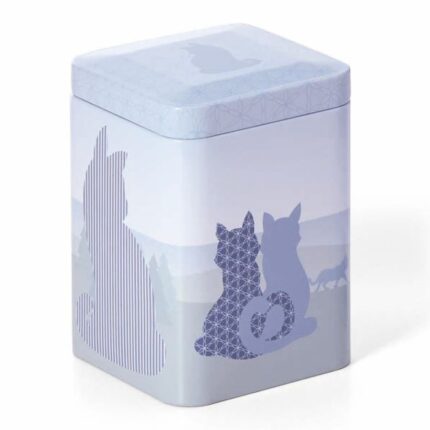 Small blue cat tea caddy with patterned cat silhouettes and a soft woodland background, perfect for storing tea and gifting to cat lovers.