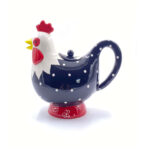 Rooster Design Teapot made from brilliant porcelain, featuring navy polka dots, red comb, and floral base