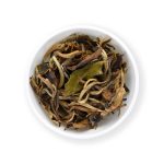 China Lapsang Pai Mu Tan BIO – white tea from controlled ecological cultivation, honey-yellow cup with smoky flavour